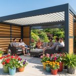 Pergola Targa collection aluminum pergola with louvered roof and slat walls over friends on a patio lounge